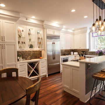Transitional White Kitchen Remodel | Glass Display Cabinets & Custom Island