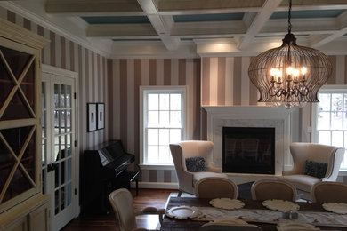 Inspiration for a mid-sized timeless light wood floor and brown floor great room remodel in Baltimore with multicolored walls, a standard fireplace and a tile fireplace