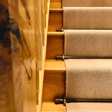 Flatweave stair runner with antique brass stair rods