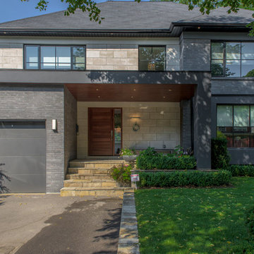 House 6 - Limestone and Grey Brick Exterior
