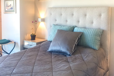 Inspiration for a mid-sized timeless guest dark wood floor bedroom remodel in Los Angeles with gray walls and no fireplace
