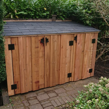 Rebuilt cedar garbage bin enclosure
