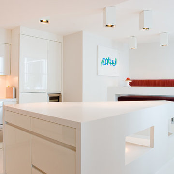 High-gloss white kitchen with Hi-Macs.