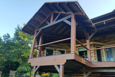 Example of a mountain style deck design in Other