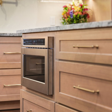 Built-in Stainless Microwave Drawer in Oak Cabinetry