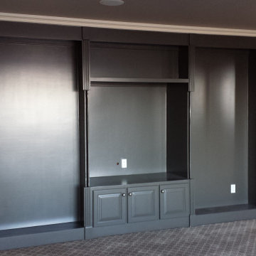 Elegant Basement Transformation with Custom Painted Ceilings and Built-Ins