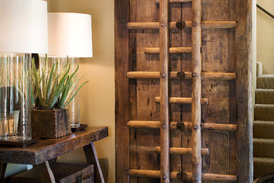 Inspiration for a southwestern foyer remodel in Phoenix with white walls