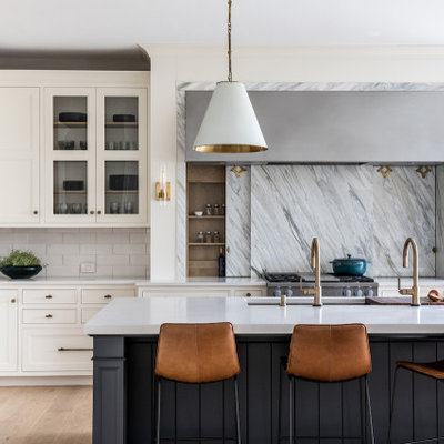 Example of a transitional home design design in Portland Maine