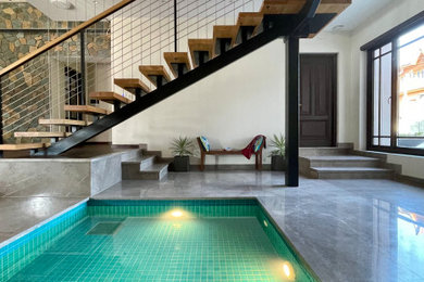 Inspiration for a contemporary pool remodel in Mumbai