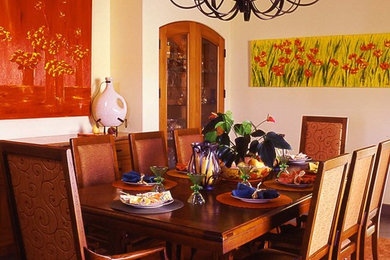 Enclosed dining room - large traditional carpeted enclosed dining room idea in Orange County with beige walls and no fireplace