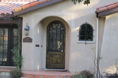 Inspiration for a mediterranean one-story stucco exterior home remodel in San Francisco