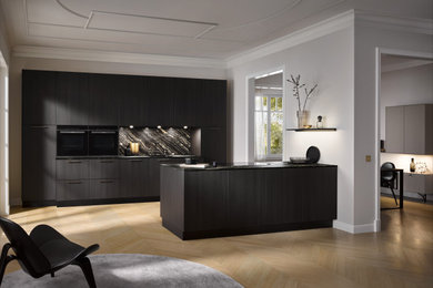 Fine black oak Modern kitchen by Kitchen shoppe