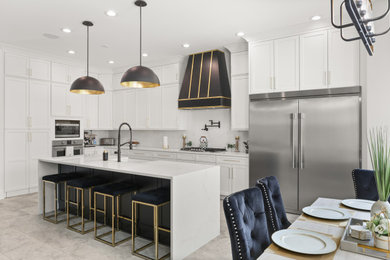 Example of a transitional kitchen design in New Orleans