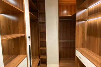 Example of a trendy closet design in New York