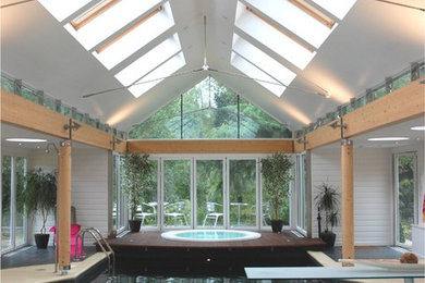 Design ideas for a contemporary indoor pool in Berkshire.