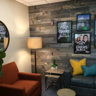 Photo of a medium sized rustic basement in Portland with beige walls, carpet and blue floors.