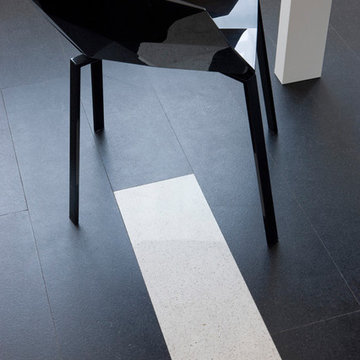 Dining room with Matte black and white floor