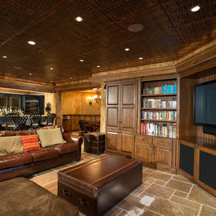 Inspiration for a large classic look-out basement in Chicago with travertine flooring.