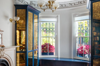 Transitional foyer photo in Boston with white walls