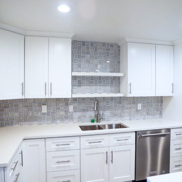 All-White Kitchen Cabinet with Porcelain Tile Backsplash