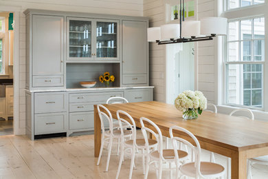 Example of a beach style dining room design in Other