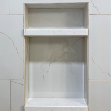 Timeless White Vanity Paired with Luxury Tiled Shower