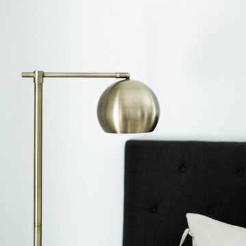 Brass Eyeball Gumball Floor Lamp Target Threshold and Gray Tufted Headboard