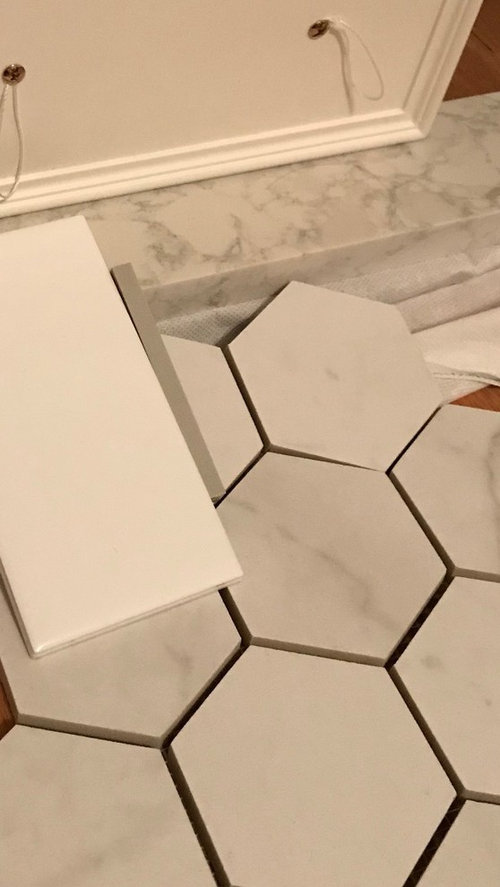 Two different grout colors in one bathroom? Shower niche?