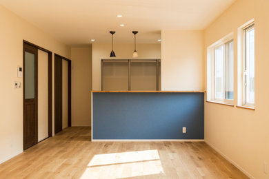 他の地域にある北欧スタイルのおしゃれなリビングの写真
