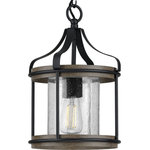 Progress Lighting - Brenham Collection Black 1-Light Outdoor Pendant - The Brenham Collection One-Light Black Mini-Pendant offers a true farmhouse feel with its mixed-elements design. Hand-painted weathered gray faux wood accent rings bookend the top and bottom of the light fixture. Black metal frame with simple metal bars and ribbon-like metal arms reach down from a central metal link chain. The frame holds a clear seeded glass shade in place that adds extra visual character.