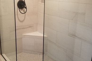 This is an example of a small contemporary master bathroom in Portland with an alcove shower, white tile, porcelain tile, white walls, vinyl floors, white floor and an open shower.
