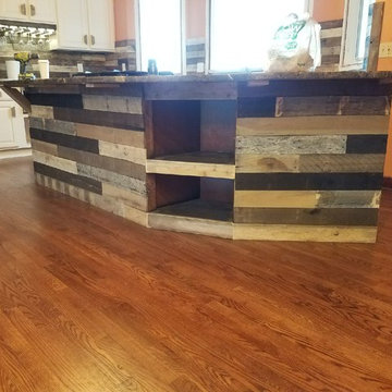 Custom Barnwood backsplash, kitchen accents, door and lighiting