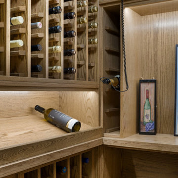 Traditional Oak Wine Cellar with Built-In Lighting – Chicago