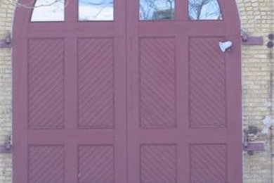 Inspiration for a double front door remodel in Minneapolis with a red front door