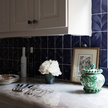 Vibrant Kitchen Remodel in Houston, TX with Custom Blue Tile Accents