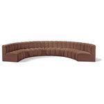 Meridian Furniture - Arc Vegan Leather Upholstered 8-Pc. Inward Curved Modular Sectional, Cognac - Unleash modern opulence with the Arc Vegan Leather 8pc. Sectional. Crafted for the modern connoisseur, this Sectional injects an air of refined luxury into any space. Its sleek silhouette, upholstered in supple cognac vegan leather, exudes timeless sophistication while the deep channel tufting adds textural intrigue, further elevating the chair's visual appeal. The modular design makes it a versatile chameleon, effortlessly adapting to your evolving needs and preferences. Whether you envision it gracing a chic living room corner, basking in the glow of a bedroom window, or adding a touch of drama to a home office, the Arc seamlessly complements your unique interior aesthetic.
