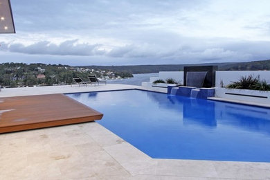 Inspiration for a large contemporary pool in Sydney.