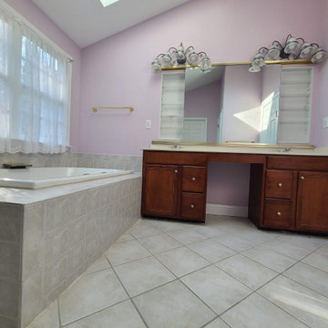 Outdated Corner Tub with Ornate Makeup Vanity (Before)