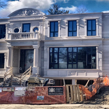Complete limestone exterior for a unique custom home in Etobicoke