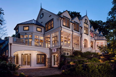 Inspiration for a cottage white exterior home remodel in Milwaukee