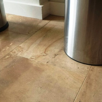 Restoring A Stained Limestone Tiled Kitchen Floor in Cardiff