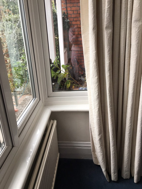 Square Bay window covering radiator below Houzz UK