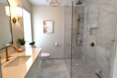 Photo of a mid-sized contemporary master bathroom in Montreal with flat-panel cabinets, white cabinets, an open shower, a one-piece toilet, beige tile, porcelain tile, beige walls, porcelain floors, an undermount sink, quartzite benchtops, beige floor, an open shower, beige benchtops, a niche, a single vanity and a floating vanity.