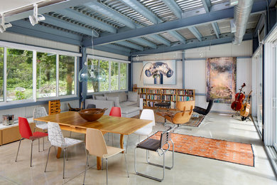 Inspiration for a large industrial enclosed and formal concrete floor living room remodel in Miami with white walls, no fireplace and no tv