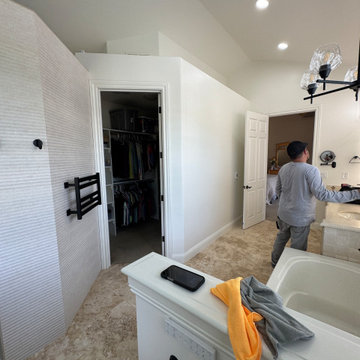Curd-less walk-in shower; heated floors in bathroom + shower+bench LED