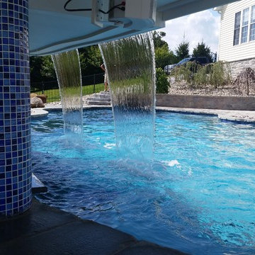 Swim up pool bar custom pool.