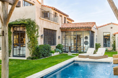 Example of a southwest home design design in San Diego