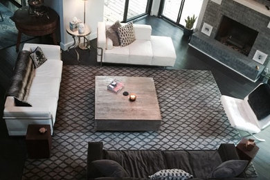 Example of a mountain style formal dark wood floor living room design in Kansas City with white walls, a standard fireplace, a brick fireplace and a wall-mounted tv