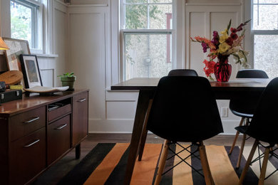 Mid-century modern dining room photo in Minneapolis