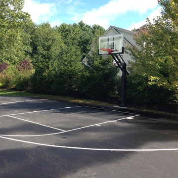 Daniel R's Pro Dunk Gold Basketball System on a 50x45 in Bedford, NH